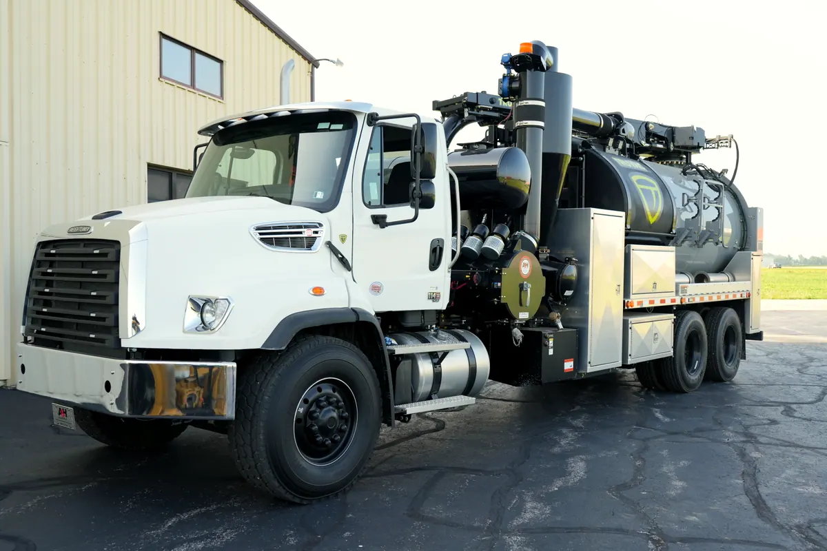 The TrueVac HXX hydro excavation truck parked in the yard, boom stowed.